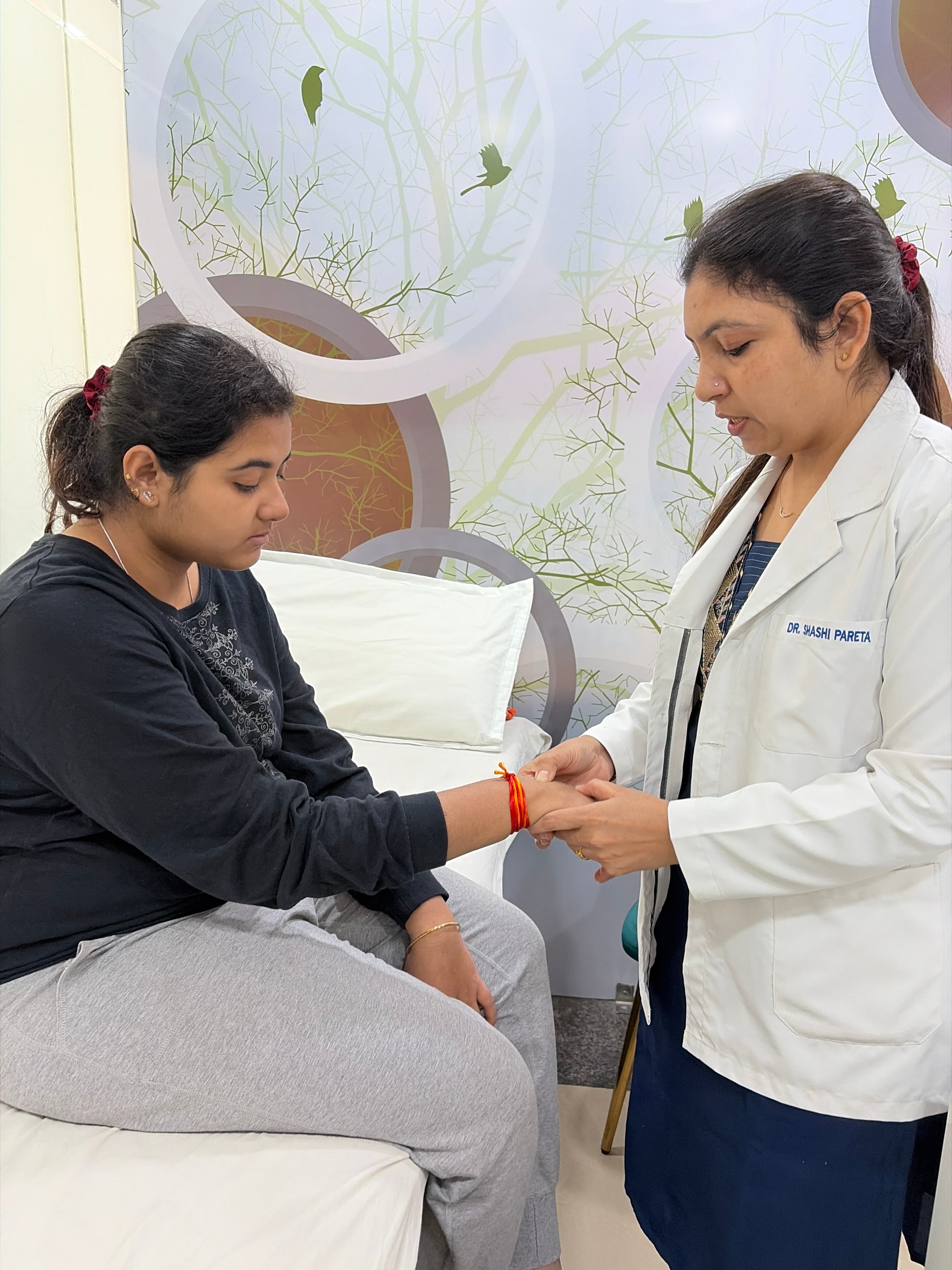 Physiotherapist providing manual therapy treatment to patient at Dr Shashi Clinic Indore
